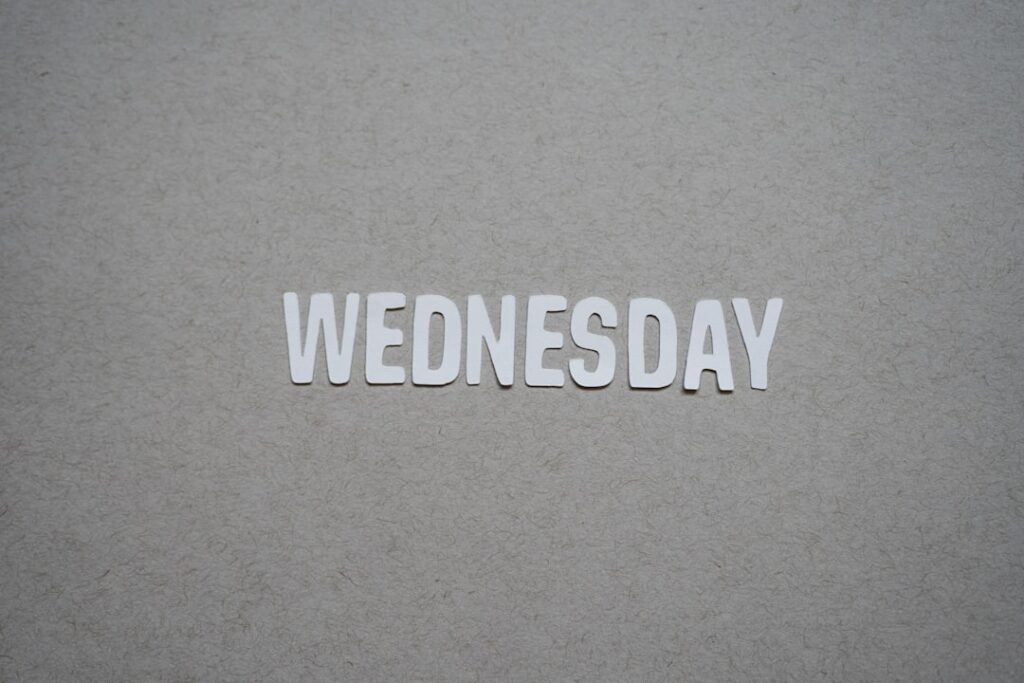 the word wednesday written in cut out letters